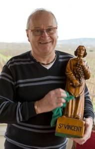 Jean-Claude Chevalier prepares Aloxe-Corton's statue of St Vincent for his big day