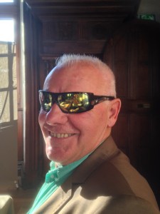 Claude Chapuis, my neighbour who contributed my preface, hiding from the sun but looking cool!