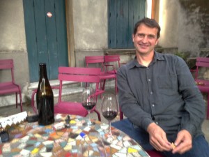 Jean-Louis Chave relaxeswith a glass of  his favourite - St Joseph !