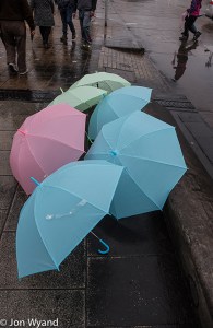 It had been raining for several days but that was about to end, sadly for this umbrella salesman.