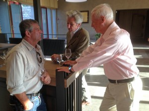 Eric Rousseau, Guillaume d'Angerville in discussion with Jacques Seysses